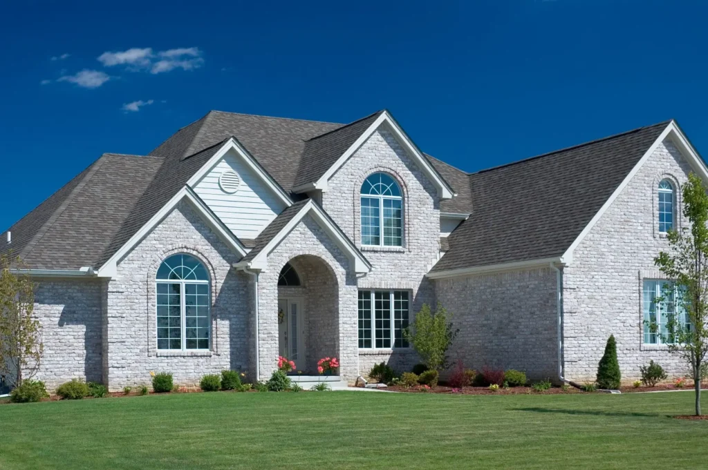 House with beautiful roof and nice curb appeal.