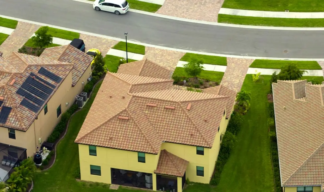 Overheard view of residential roofs and homes.