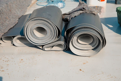 Two rolls of TPO for installation on the rooftop.